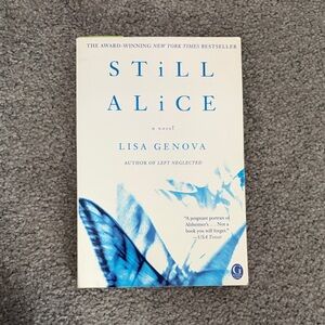 Still Alice by Lisa Genova - White & Blue Paperback Novel